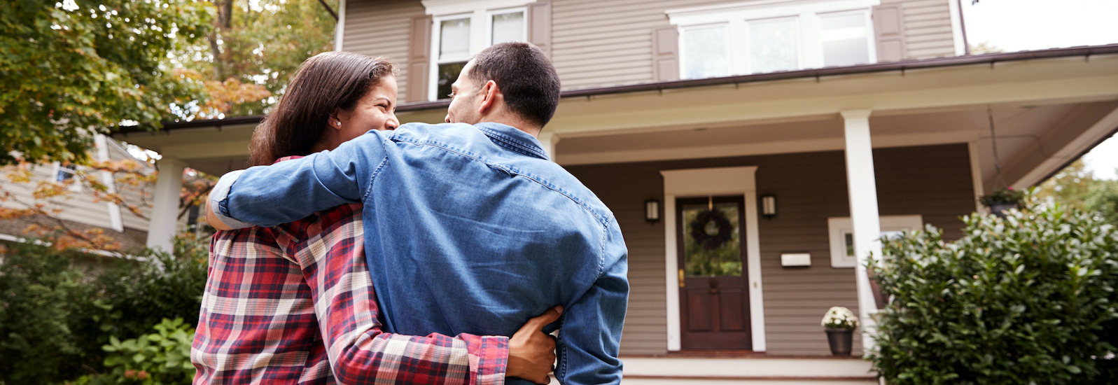 man and women looking at new home